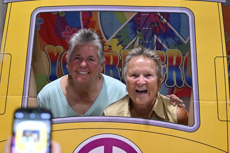 Beep, beep! Gail Dumonceaux and Paula Walker have a blast at the party.
