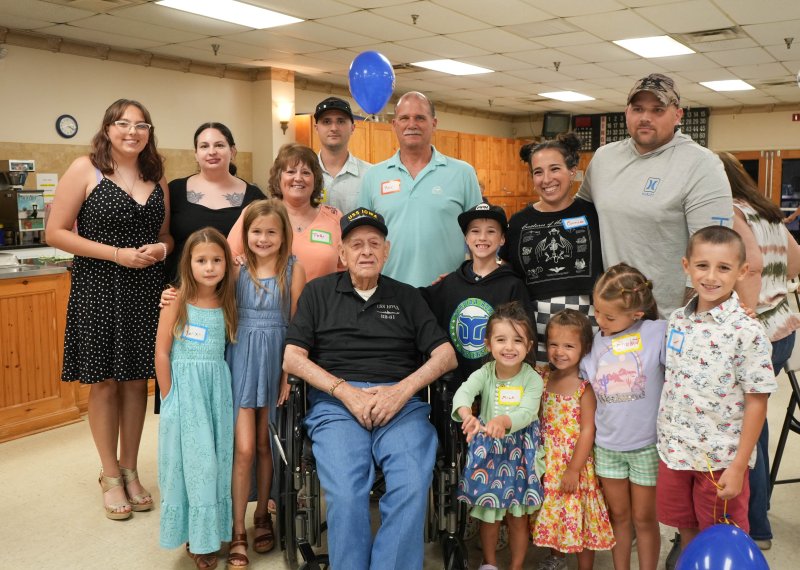 Many of Raymond’s relatives, including several great-great-grandnieces/nephews whom he met for the first time, attended the party. The adults shown in back are (l-r) Lori and Amanda McDonald, Pat Uroda, Shaun Uroda, Ray Uroda, Connie Uroda and Nick Uroda. Raymond is seated in his wheelchair in the front. The kids in front are Marina, Reagan, Colton, Mila, Evelyn, Charlotte and Owen. ELLEN MCINTYRE PHOTOS