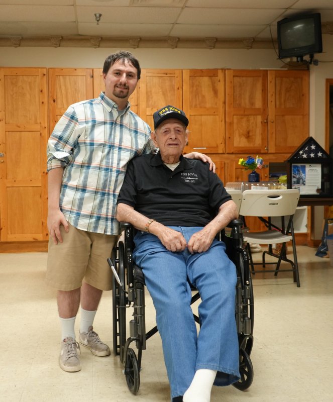 Evan Kean, Raymond Sproul’s step-grandson, left, spoke at his party.