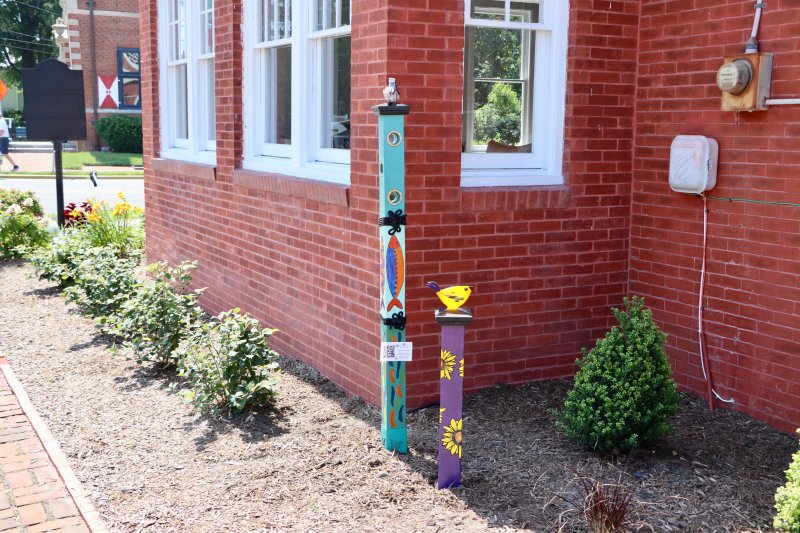 Art in Bloom placed prototypes of the garden story poles at the Delaware Community Foundation building at 302 Savannah Road during the Lewes Garden Tour June 21.