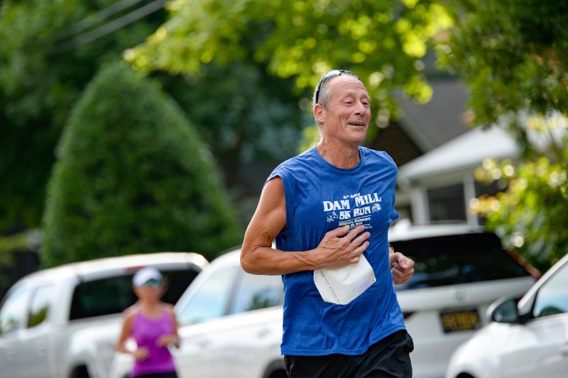 Mike Piorkowski, 64, completes Strider 5-Miler.