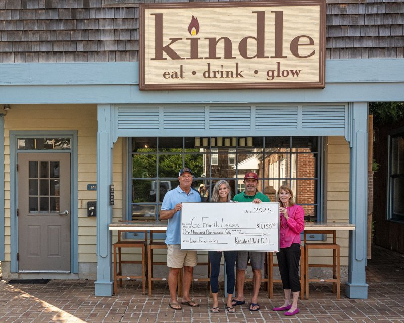 Go Fourth fireworks fundraiser check presentation attendees shown are (l-r) Russ Palmer, Go Fourth chair; Ali DiSabatino and Matt DiSabatino, Half Full and Kindle owners; and Betsy Reamer, Go Fourth secretary. SUBMITTED PHOTOS
