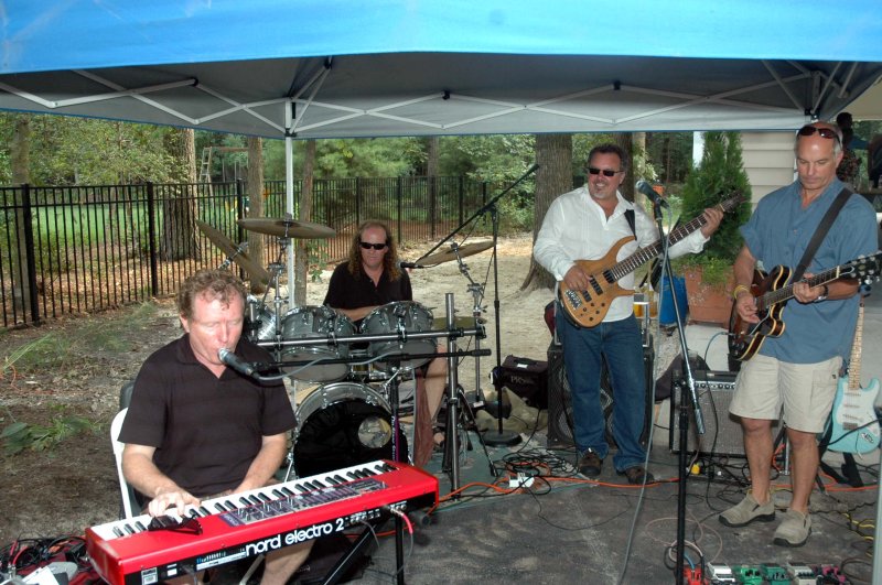 Shockley and Mack brothers play in Rob Medd’s driveway.