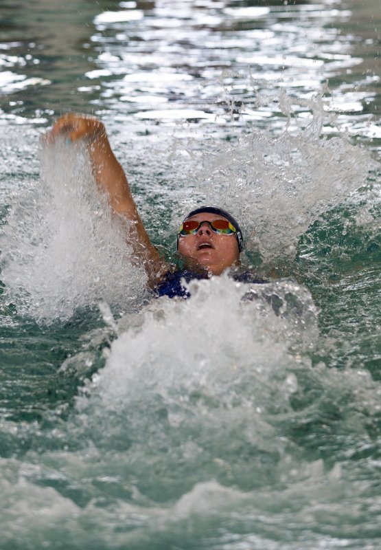 LYC’s Jenna Reinhold swims the 50 back.