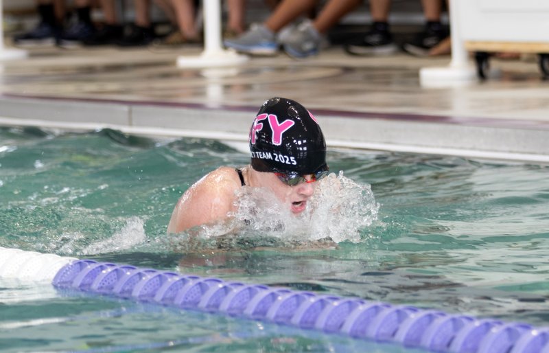 SFY’s Gretchen Maughan swims the 100 IM.