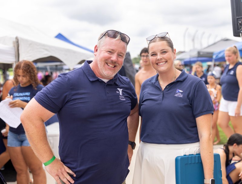 SFY coach Mike VanSant, left, smiles with LYC coach Camrynn McTeer.