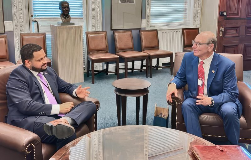Rep. Jeff Hilovsky, R-Long Neck, right, recently met with Sam Martinez, presidential regional liaison, about financial literacy for students. SUBMITTED PHOTO