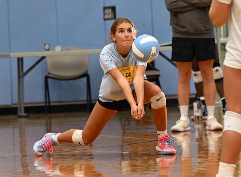 Cape junior Camilla Willis makes a return on a serve.