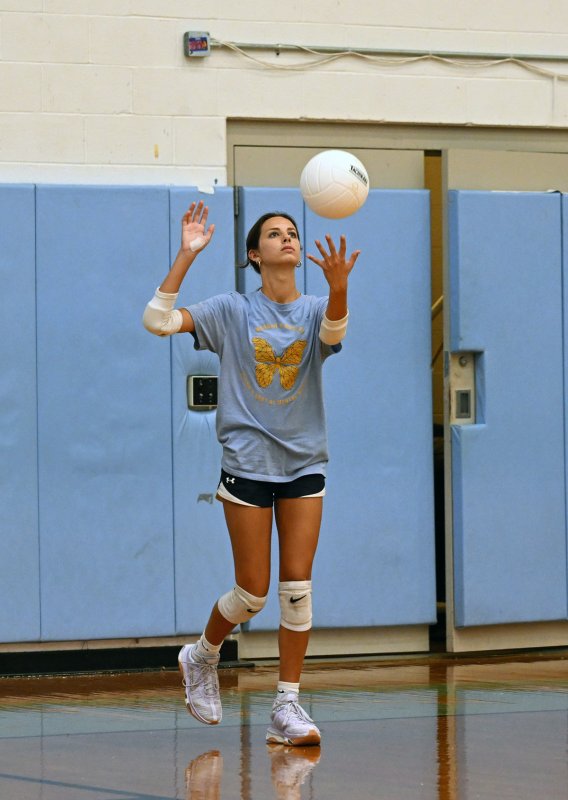 Cape senior Kaylee Sockriter serves a winner.