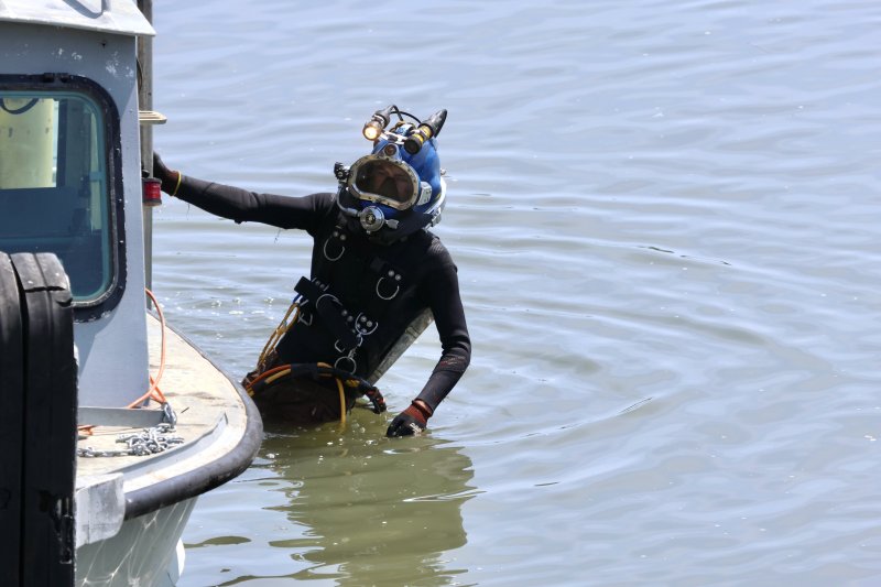 A diver prepares to inspect the canal crossing water main that failed on the morning of Aug. 20, 2024, leaving the City of Lewes without tap water. Tom Panetta, Board of Public Works president, said the failure was caused by an unsupported pipe due to scouring from the current in the canal. A new canal crossing was installed and became operational as of March 18.
BILL SHULL PHOTO