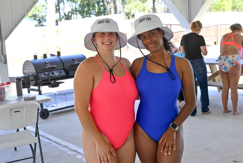 Counselors Alyssa Kelsey, left, and Jo’Mara Drummond smile for the camera.