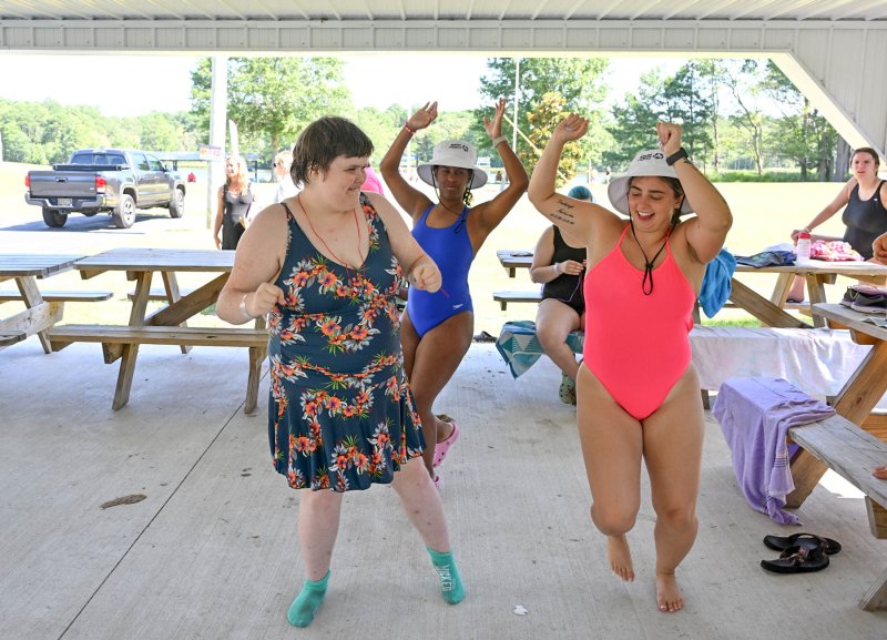Athlete Stormi Morris cuts a rug with counselors Jo’Mara Drummond and Alyssa Kelsey.
