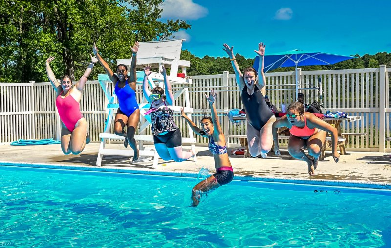 Jumping for joy at Camp Barnes pool are (l-r) Alyssa Kelsey, Jo’Mara Jackson, Cailee Layton, Sara Perrotta, Sara Giles and Armani Jackson. DAN COOK PHOTOS