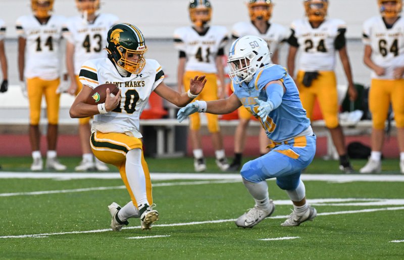 Cape senior linebacker Robbie Payton goes in for a tackle on Saint Mark’s quarterback Brett Greene.
