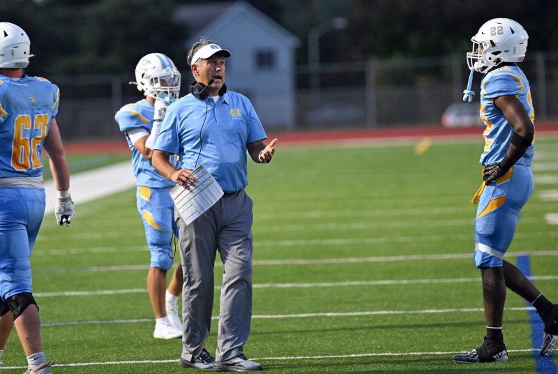 Cape coach Chip Knapp speaks with Oz Batson.