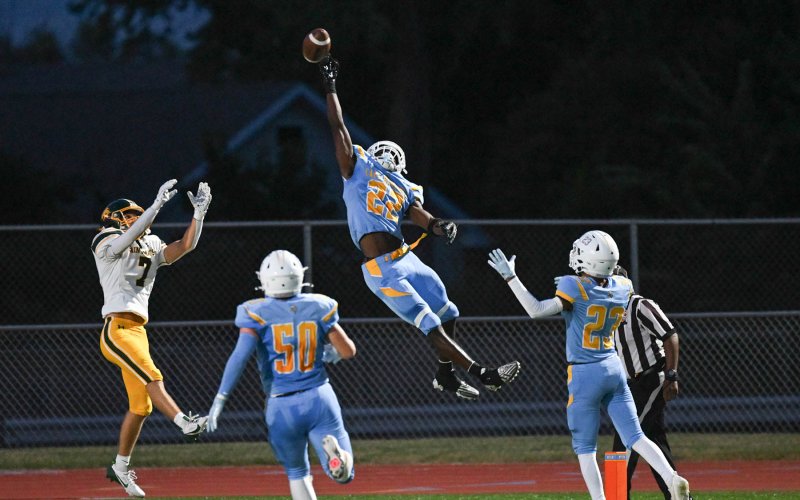 Cape’s Oz Batson breaks up a pass intended for Colin Foley.