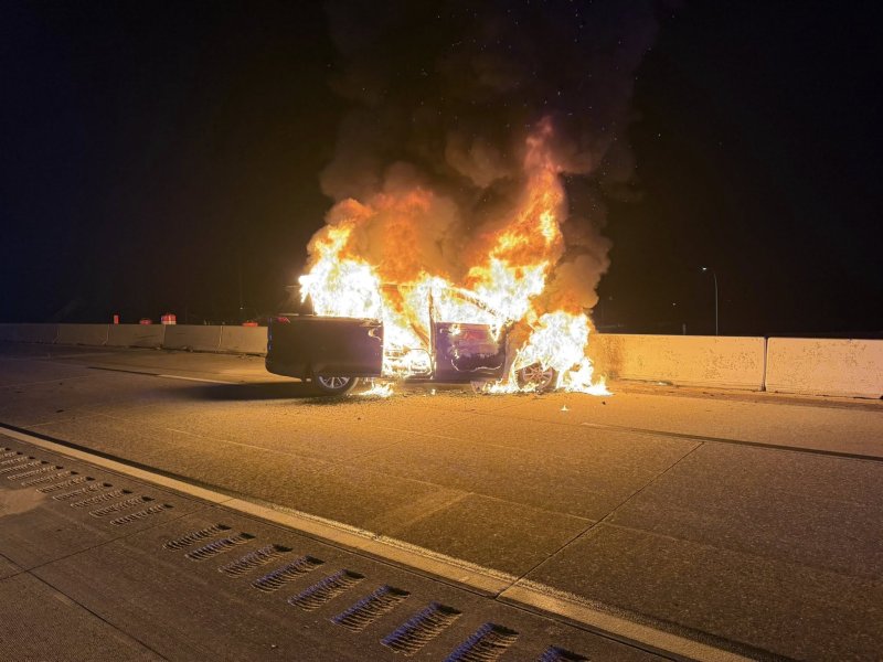 A vehicle burns Aug. 23 following a crash on Route 1 near Route 16. MILTON FIRE DEPARTMENT PHOTO