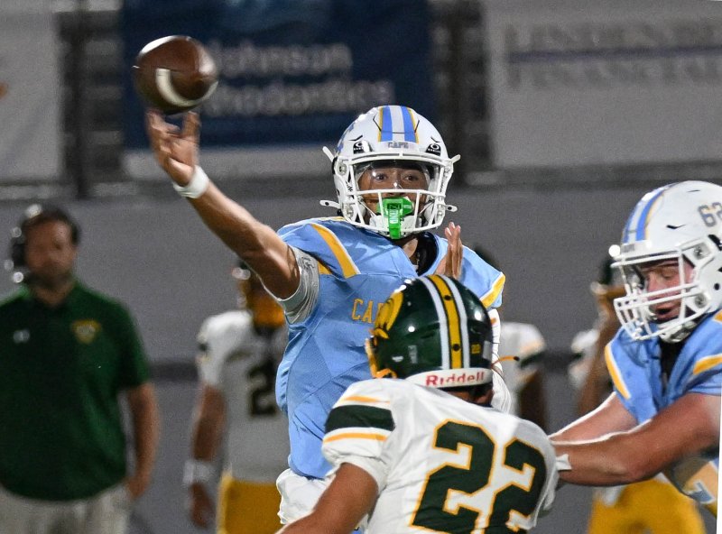 Cape quarterback Jameson Tingle throws to Oz Batson for a touchdown in the 33-3 win over Saint Mark’s. DAN COOK PHOTOS