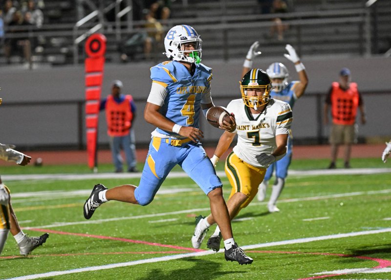 Cape junior quarterback Jameson Tingle runs in for one of his two rushing touchdowns.