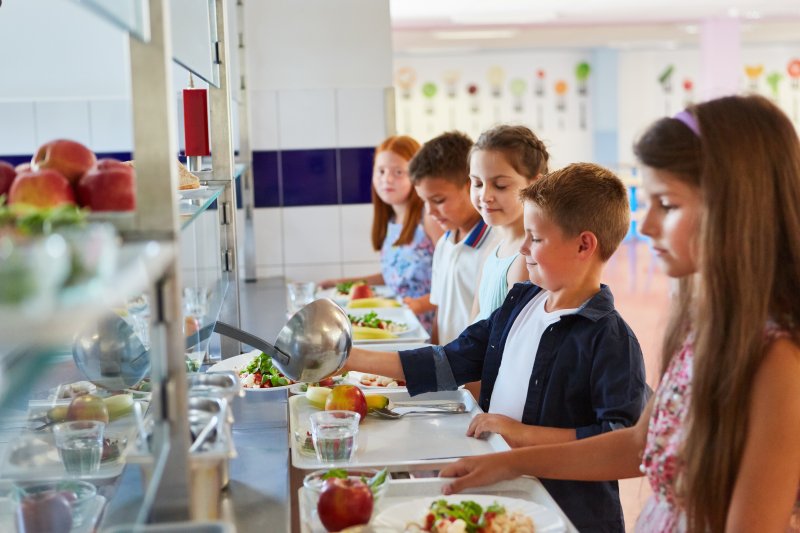 The Cape Henlopen School District has been approved for the Community Eligibility Provision, through which all students will receive free school meals. The program goes into effect in the district in early September. SOURCE: ADOBE STOCK/ROBERT KNESCHKE