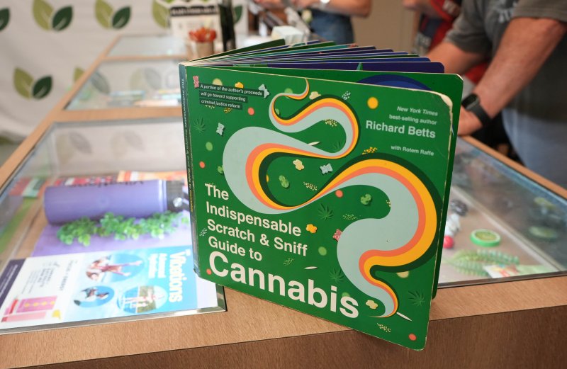 On display by the products for sale at Thrive Dispensary near Lewes is “The Indispensable Scratch & Sniff Guide to Cannabis,” a book by Richard Betts.