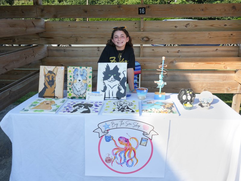 Chloe Arjona, a fifth-grader at Love Creek Elementary, sells a variety of unique artwork, including pet portraits, ceramics, 3D beach-inspired collages and more, at her booth, Buy The Sea Shop. She also takes commissions for personalized dog portraits.