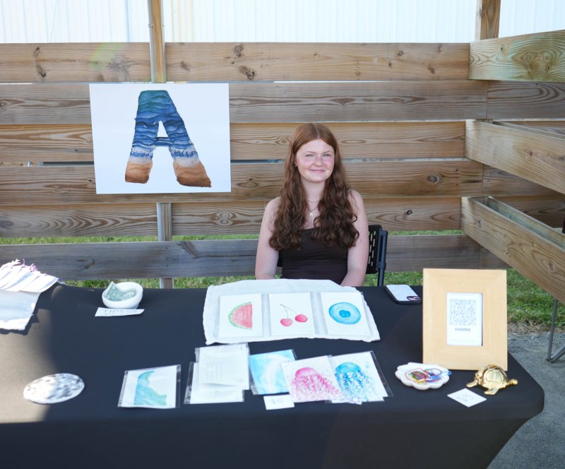 Annika Haney, a rising sophomore at Cape High, sells coastal-inspired watercolor postcards, paintings, bookmarks and jewelry.