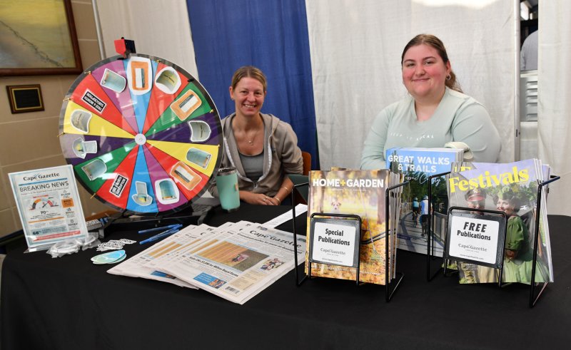 Taking subscription orders for the Cape Gazette are Charity Vernon, left, and Liz Tedley.