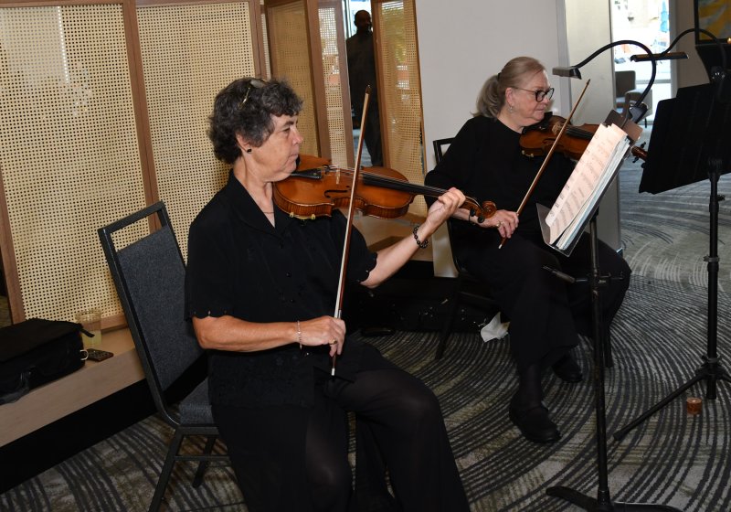 Michelle Peters, left, and Cecilia Conway provide musical entertainment.