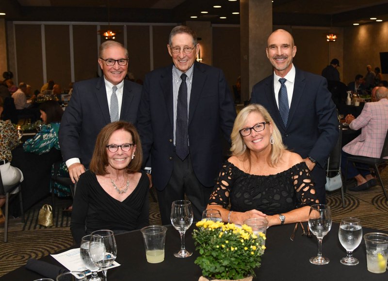 Enjoying the evening are Meals on Wheels supporters in back (l-r) Rob DeAndrade, Gil Hofheimer and Mike Linthicum. In front are Mary DeAndrade and Kathy Linthicum.