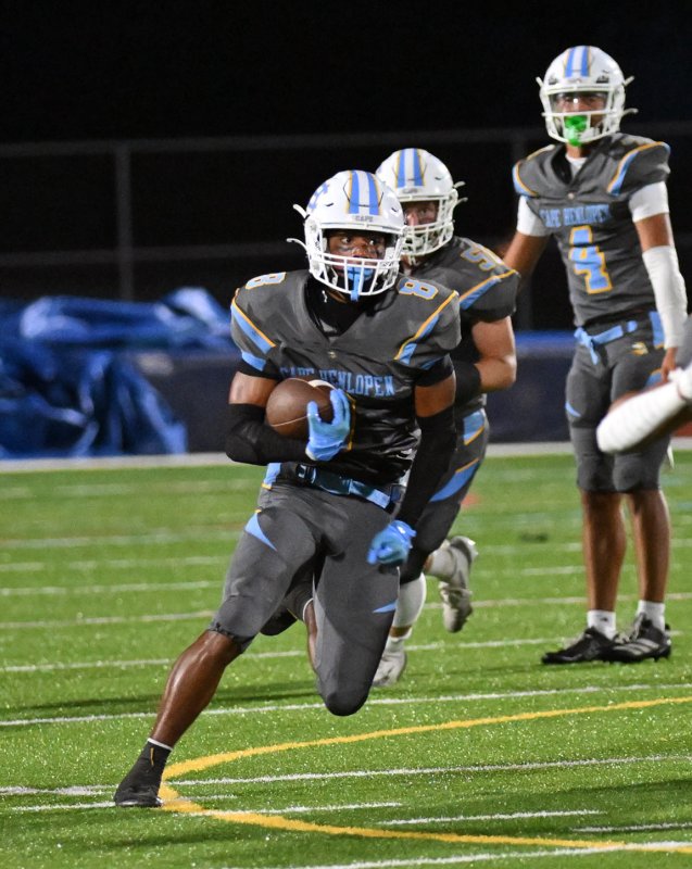 Ty Handy runs for a first down.