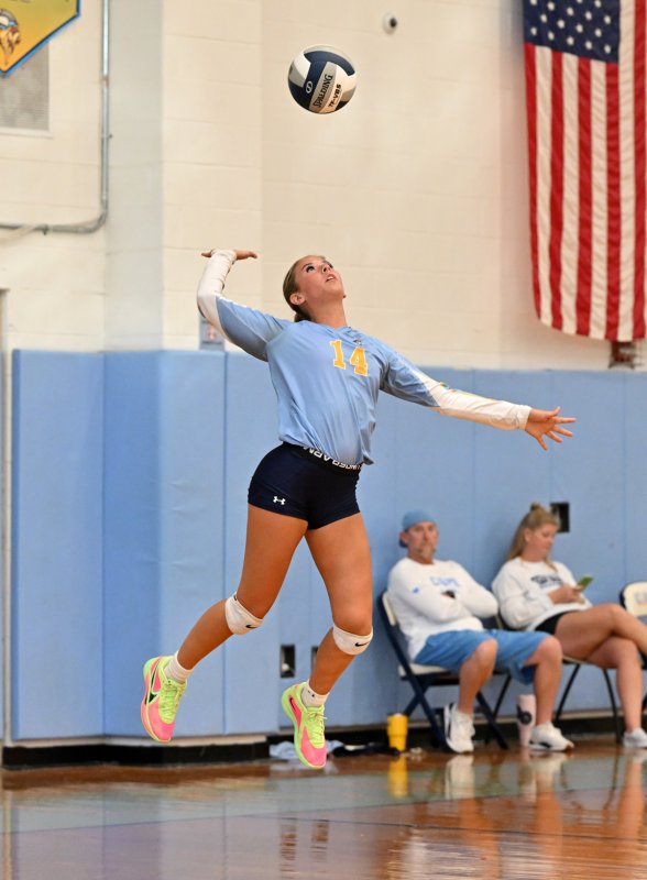 Cape senior Rylee Ockels slams a serve.
