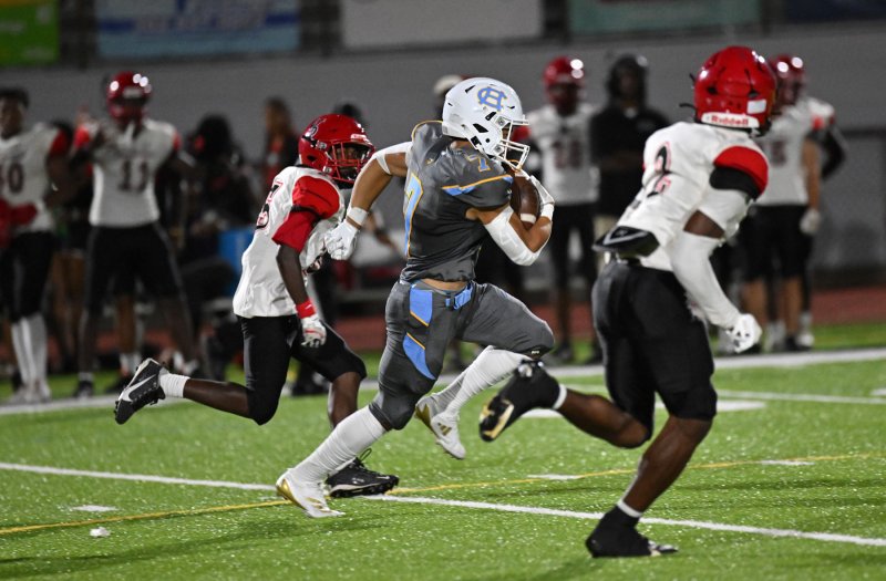 Anthony Francis runs back a kickoff to the three-yard line.