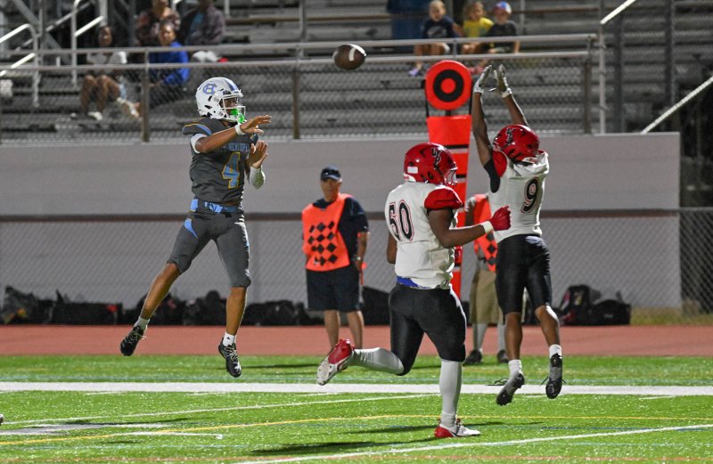 Jameson Tingle gets major air passing into the end zone.