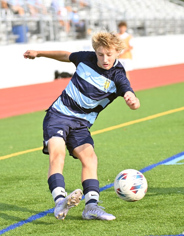 Cape sophomore Colby Wheeler hits a centering pass.