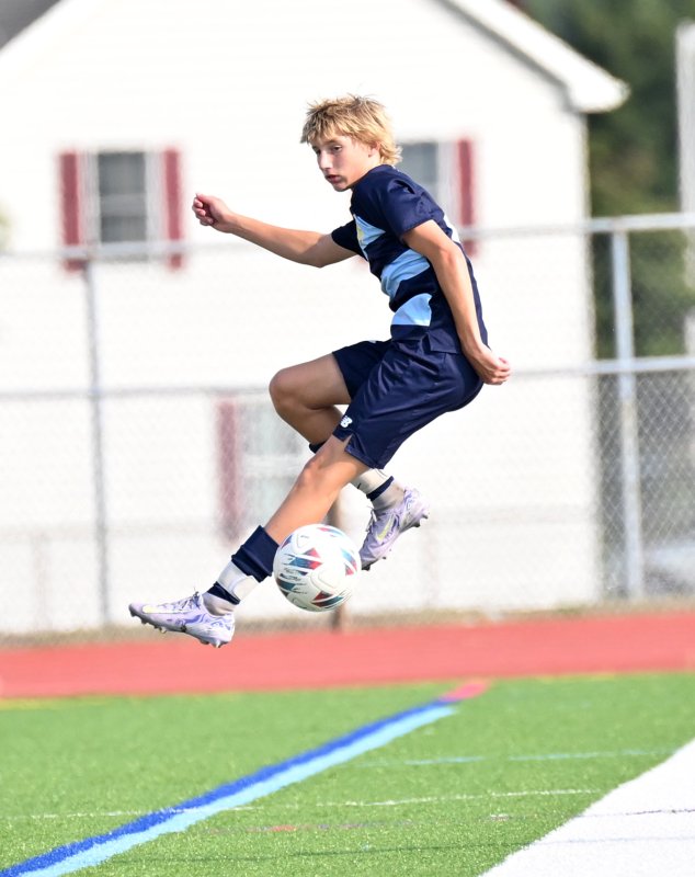 Cape sophomore Colby Wheeler gets major air to control a high bouncer.