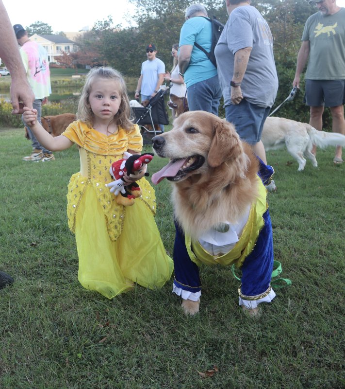 Beauty Aliyah and her Beast Tucker enjoy the event.