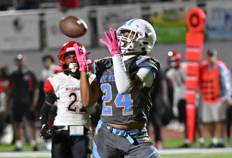 Cape senior Del Richards snags a Jameson Tingle pass and runs for a touchdown.