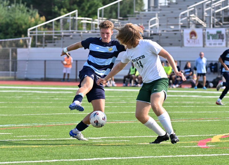Cape junior Austin Tyndall controls thew ball away from Odessa’s Jack Seda.