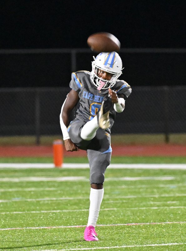 Cape punter Navin Duffy blasts one downfield.