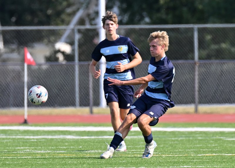 Cape junior Seth Benjamin blasts a centering pass.