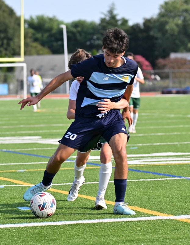 Cape’s Alan Hernandez-Becerra battles for possession with Landon Benoit.