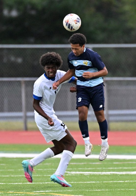 Cape’s senior Jorge Ruiz heads the ball away from Cavaliers sophomore Ethan Earle.