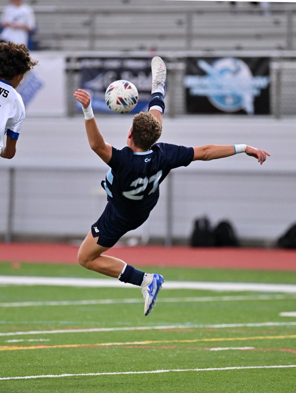 Cape junior Austin Tyndall just misses a bicycle kick.