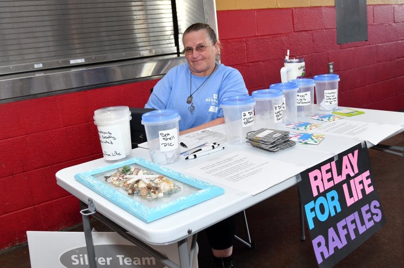 Dorothy Griffin runs a raffle table to raise funds for Relay For Life.