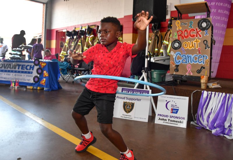 Carson Crumb, 7, demonstrates his skill with the Hula Hoop.