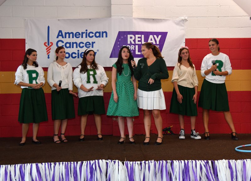 Performing a song from “Grease” are (l-r) Willow DiMichele, Estelle Edwards, Sofia Rossi, Skylar Jemele, Addison Varney, Sydney Mears and Marley Fyock.