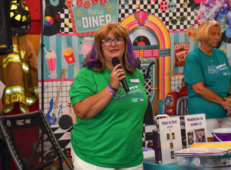 Kathy Blanchette, Relay for Life volunteer chair, welcomes survivors and their family and friends to the event.