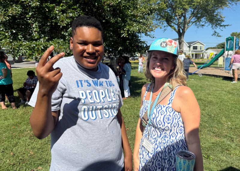 Posing for a photo together are Kentrell Weber, left, and Julie Derrick, school board member. SUBMITTED PHOTOS