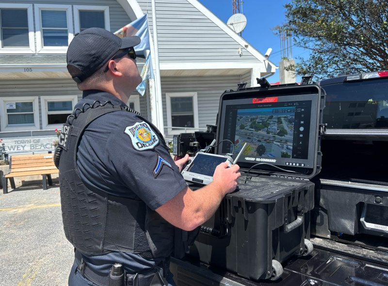 Pfc. James Rieley, supervisor of the Dewey Beach Police Department’s drone unit, remotely flies one of the department’s drones. Footage from the drone’s camera is shown on the screen in front of him. ELLEN MCINTYRE PHOTOS